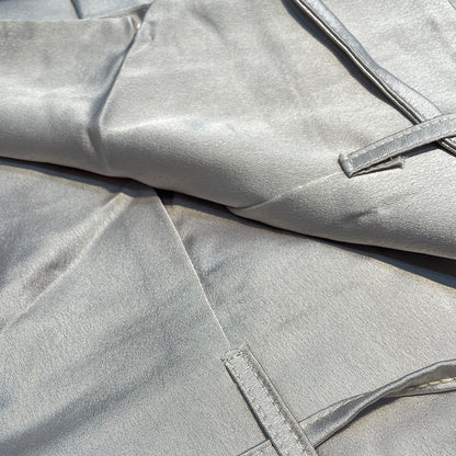 Tweedelige satijnen set met haltertop en wijde broek